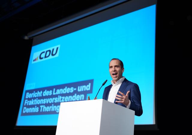 16 October 2025, Hamburg: Dennis Thering (R), party chairman of the 
Christian Democratic Union of Germany (CDU) Hamburg, speaks during the state party conference of the CDU Hamburg in the Buergerhaus Wilhelmsburg. Photo: Marcus Brandt/dpa