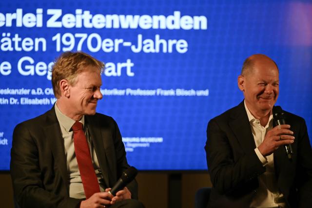 16 October 2025, Brandenburg, Potsdam: Former Federal Chancellor Olaf Scholz (R) speaks at a historical discussion with historian Frank Boesch at the Brandenburg Museum for Future, Present and History. Photo: Lilli Förter/dpa