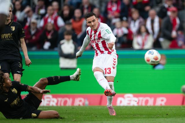 18 October 2025, North Rhine-Westphalia, Cologne: Cologne's Said El Mala scores the his side's first goal during the German Bundesliga soccer match between 1. FC Cologne and FC Augsburg at RheinEnergieStadion. Photo: Marius Becker/dpa - WICHTIGER HINWEIS: Gemäß den Vorgaben der DFL Deutsche Fußball Liga bzw. des DFB Deutscher Fußball-Bund ist es untersagt, in dem Stadion und/oder vom Spiel angefertigte Fotoaufnahmen in Form von Sequenzbildern und/oder videoähnlichen Fotostrecken zu verwerten bzw. verwerten zu lassen.