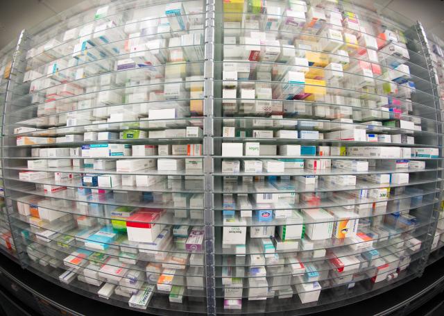 FILED - 29 April 2015, Hamburg: Medicines on the shelves of a pharmacy picking machine. Germany is increasingly reliant on China for key pharmaceutical ingredients, raising the risk of supply disruptions that Beijing could exploit for political leverage, according to a new report by the German generics association Pro Generika. Photo: Daniel Reinhardt/dpa