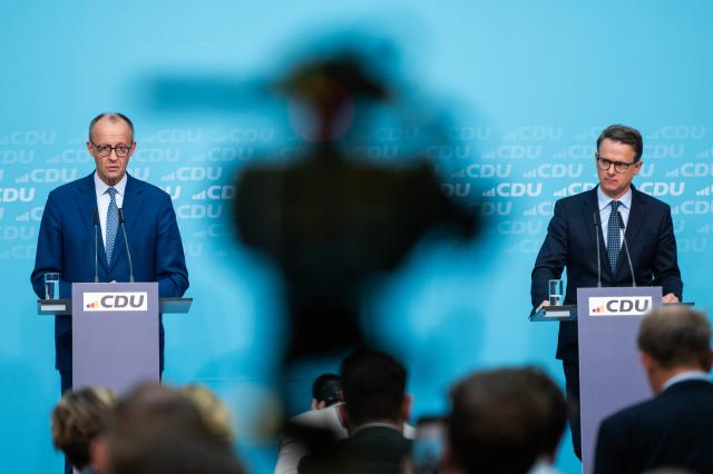20 October 2025, Berlin: German Chancellor Friedrich Merz (L) and Carsten Linnemann, Christian Democratic Union (CDU) Secretary General speak at a press conference at the end of the CDU Presidium's closed meeting. Photo: Christophe Gateau/dpa