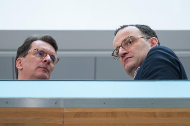 20 October 2025, Berlin: Hendrik Wuest (L), Minister President of North Rhine-Westphalia, and Jens Spahn, Chairman of the Christian Democratic Union (CDU) parliamentary group in the Bundestag, talk after a press conference at the end of the CDU Presidium's closed meeting. Photo: Christophe Gateau/dpa