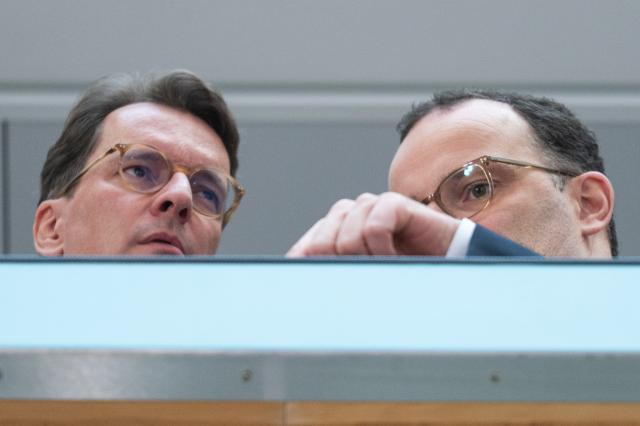 20 October 2025, Berlin: Hendrik Wuest (L), Minister President of North Rhine-Westphalia, and Jens Spahn, Chairman of the Christian Democratic Union (CDU) parliamentary group in the Bundestag, talk after a press conference at the end of the CDU Presidium's closed meeting. Photo: Christophe Gateau/dpa