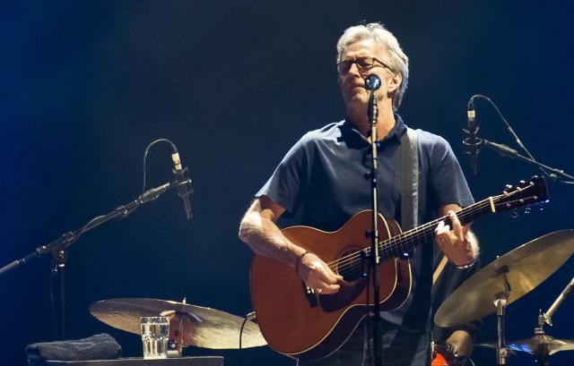 FILED - 29 May 2013, Hessen, Frankfurt/Main: Renowned guitarist and singer Eric Clapton performs during a concert in the Festhalle. Clapton will play three concerts in Germany in May next year, barely a month after he turns 81. Photo: Nicolas Armer/dpa