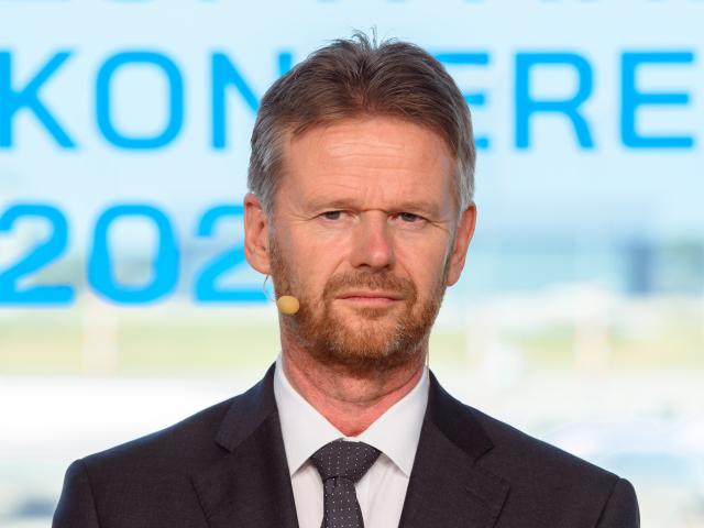FILED - 18 June 2021, Brandenburg, Schoenefeld: Peter Gerber, then CEO of the Belgian airline and Lufthansa subsidiary Brussels Airlines, attends the National Aviation Conference 2021 at Berlin Brandenburg Airport. Gerber, CEO of German aviation company Condor, believes the German government should cover the costs of the military component of air traffic control services. Photo: Soeren Stache/dpa-Zentralbild/POOL/dpa