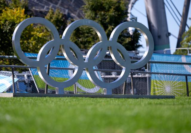 FILED - 19 September 2025, Bavaria, Munich: The Olympic rings stand in the Olympic Park. Most Germans are in favour of the nation's Olympic bid, according to a survey conducted by the YouGov market reaearch company on behalf of dpa. Photo: Sven Hoppe/dpa