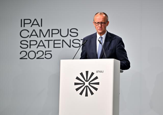 21 October 2025, Baden-Württemberg, Heilbronn: German Chancellor Friedrich Merz speaks on stage at the ground-breaking ceremony for the IPAI Campus during his inaugural visit to the state. Photo: Jan-Philipp Strobel/dpa