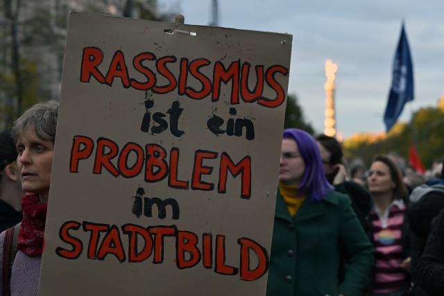21 October 2025, Berlin: Women hold placards durin the "We are the daughters" rally organized by the "Together Against the Right" initiative in front of the CDU federal office in response to Chancellor Friedrich Merz's statements linking migration to problems in German cities. Merz told a journalist that he has "nothing to take back" and added that "anyone who sees it in everyday life" knows that he is right. People who had daughters would know exactly what he meant, Merz said. Photo: Lilli Förter/dpa