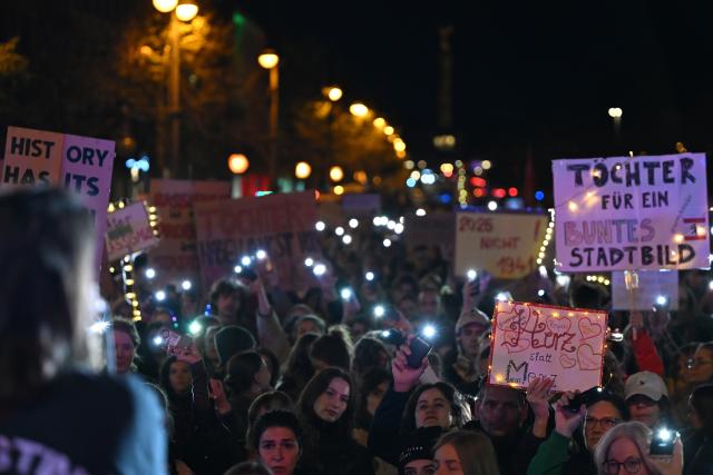 21 October 2025, Berlin: People hold placards during the "We are the daughters" rally organized by the "Together Against the Right" initiative in front of the CDU federal office in response to Chancellor Friedrich Merz's statements linking migration to problems in German cities. Merz told a journalist that he has "nothing to take back" and added that "anyone who sees it in everyday life" knows that he is right. People who had daughters would know exactly what he meant, Merz said. Photo: Lilli Förter/dpa