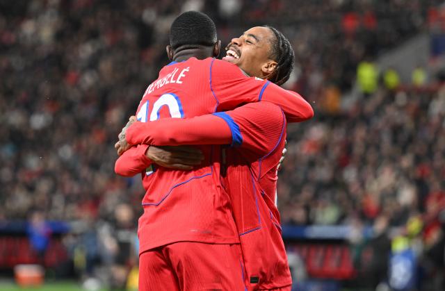 21 October 2025, North Rhine-Westphalia, Leverkusen: Paris St. Germain's Ousmane Dembele celebrates after scoring his side's sixth goal during the UEFA Champions League soccer match between Bayer Leverkusen vs Paris Saint-Germain. Photo: Bernd Thissen/dpa