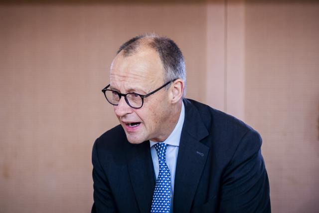 22 October 2025, Berlin: Germany's Chancellor Friedrich Merz sits at the Cabinet table at the start of the German Cabinet meeting in the Chancellery. Photo: Christoph Soeder/dpa