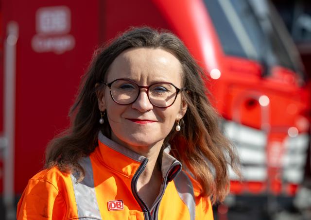 FILED - 15 March 2024, Saxony-Anhalt, Halle (Saale): CEO of Deutsche Bahn (DB) Cargo Sigrid Nikutta stands in front of a new type of hybrid locomotive at the freight depot. Photo: Hendrik Schmidt/dpa