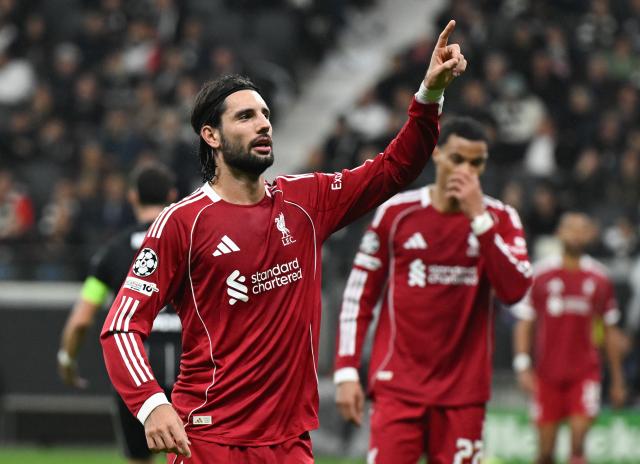 22 October 2025, Hesse, Frankfurt_Main: Liverpool's Dominik Szoboszlai celebrates scoring his side's fifth goal during the UEFA Champions League soccer match between Eintracht Frankfurt and Liverpool FC at the Deutsche Bank Park. Photo: Arne Dedert/dpa