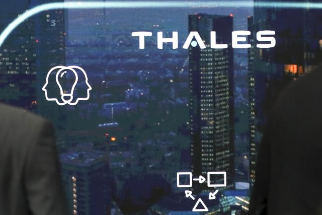 FILED - 05 April 2017, Hamburg: Visitors flock to the booth of Thales at the Aircraft Interiors Expo in Hamburg. Photo: Christian Charisius/dpa
