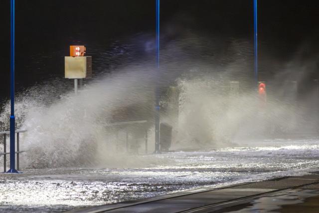 24 October 2025, Schleswig-Holstein, Dagebüll: Water from the North Sea presses against the ferry port of Dagebüll during a storm, as storm depression 'Joshua' passes over Germany as an autumn storm. Photo: Bodo Marks/dpa