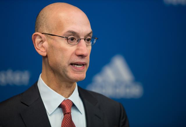 FILED - 08 October 2014, Berlin: Then NBA commissioner Adam Silver speaks during a press conference prior to the NBA Global Games match between Alba Berlin and San Antonio Spurs at O2 World in Berlin. NBA boss Adam Silver spoke publicly for the first time about the unexpected arrests of Portland Trail Blazers coach Chauncey Billups and Miami Heat player Terry Rozier that sent shock waves through the basketball league. Photo: picture alliance / dpa