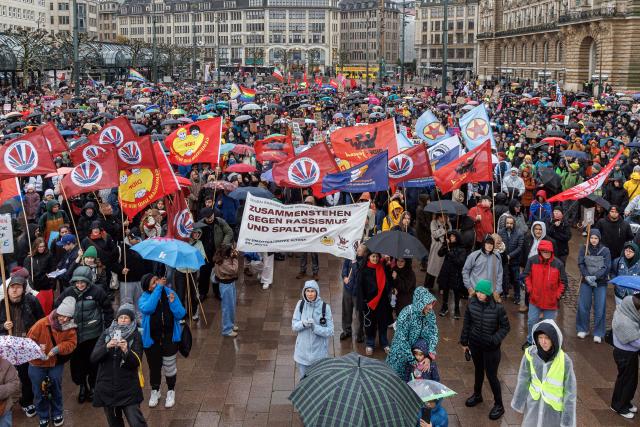 25 October 2025, Hamburg: People gather at the Rathausmarkt for a demonstration under the slogan "We are the cityscape", against Chancellor Merz's statements on the cityscape and migration in Hamburg. Photo: Markus Scholz/dpa