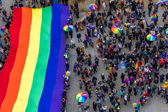 25 October 2025, Brandenburg, Cottbus: People take part in the 17th Christopher Street Day (CSD) demonstration for Cottbus and Lower Lusatia under the motto "United in peace and diversity". Photo: Frank Hammerschmidt/dpa