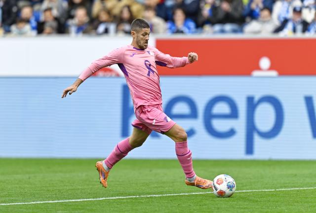 25 October 2025, Sinsheim: Hoffenheim's Andrej Kramaric scores his side's third goal during the German Bundesliga soccer match between TSG 1899 Hoffenheim and 1. FC Heidenheim at the PreZero Arena. Photo: Uwe Anspach/dpa - IMPORTANT NOTICE: DFL and DFB regulations prohibit any use of photographs as image sequences and/or quasi-video.