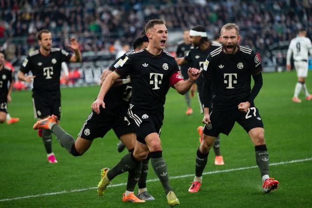 25 October 2025, North Rhine-Westphalia, Moenchengladbach: Bayern Munichs' Joshua Kimmich celebrates scoring his side's first goal during the German Bundesliga soccer match between Borussia Moenchengladbach and Bayern Munich at Borussia Park stadium. Photo: Marius Becker/dpa - IMPORTANT NOTICE: DFL and DFB regulations prohibit any use of photographs as image sequences and/or quasi-video.