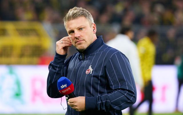 25 October 2025, North Rhine-Westphalia, Dortmund: Cologne's Coach Lukasz Kwasniok gives an interview before the German Bundesliga soccer match between Borussia Dortmund and 1. FC Cologne at the Signal Iduna Park. Photo: Bernd Thissen/dpa - IMPORTANT NOTE: In accordance with the regulations of the DFL German Football League and the DFB German Football Association, it is prohibited to utilize or have utilized photographs taken in the stadium and/or of the match in the form of sequential images and/or video-like photo series.