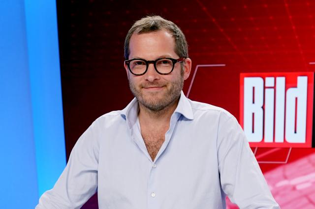 FILED - 16 August 2021, Berlin: Then editor-in-chief of "Bild" Julian Reichelt stands in the studio of the TV station "Bild". The editor-in-chief of a right-wing German news portal is under investigation by Berlin police on suspicion of incitement to hatred over a post on social media. Photo: Jörg Carstensen/dpa