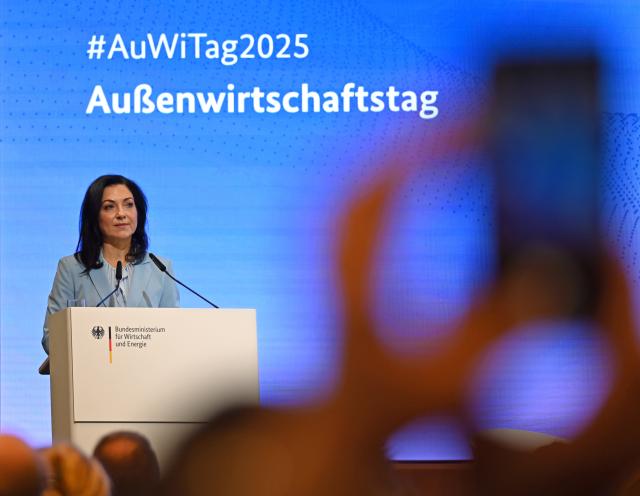 28 October 2025, Berlin: Katherina Reiche, German Minister for Economic Affairs and Energy, speaks at the Foreign Trade Day on opportunities for German foreign trade in the geopolitical field of tension. The event at the Haus der Deutschen Wirtschaft in Berlin is organized by the Federal Ministry for Economic Affairs and Energy together with Germany Trade & Invest (GTAI). Photo: Elisa Schu/dpa