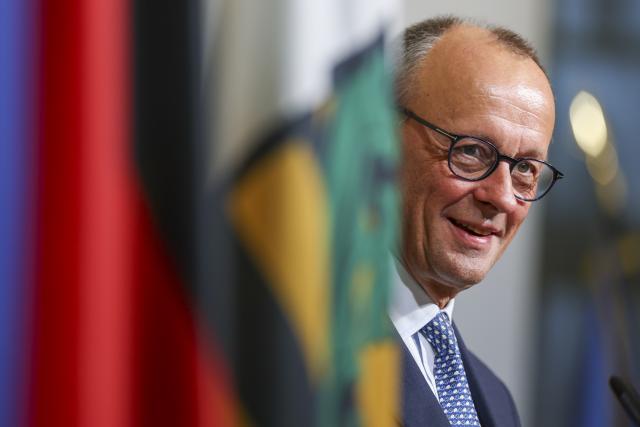 28 October 2025, Saxony, Dresden: German Chancellor Friedrich Merz stands in the Saxony State Chancellery during his inaugural visit. Photo: Jan Woitas/dpa