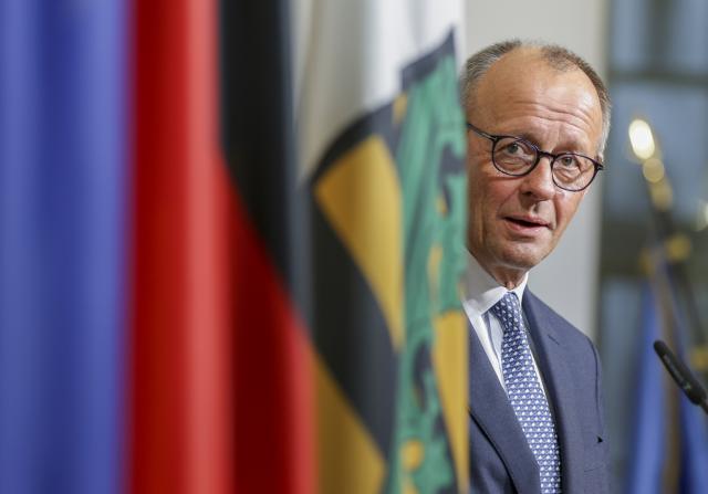 28 October 2025, Saxony, Dresden: German Chancellor Friedrich Merz stands in the Saxony State Chancellery during his inaugural visit. Photo: Jan Woitas/dpa