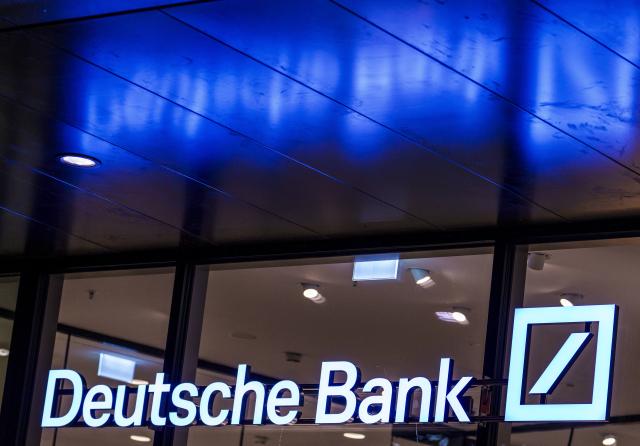 FILED - 30 January 2025, Hesse, Frankfurt/Main: The Deutsche Bank logo lights up at the bank's headquarters. Photo: Andreas Arnold/dpa