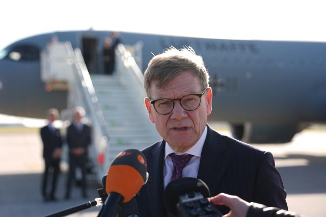 29 October 2025, Brandenburg, Schönefeld: Johann Wadephul, German Minister of Foreign Affairs, makes a press statement at the military section of BER Berlin-Brandenburg Airport in front of an Airbus A 321 of the Air Force's Air Wing for the flight to the Middle East. Wadephul's trip will focus on the further implementation of US President Trump's Gaza peace plan. Photo: Marcus Brandt/dpa