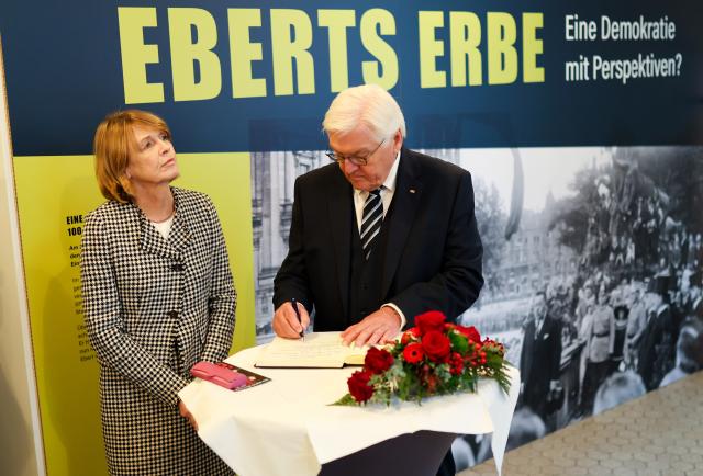 30 October 2025, Baden-Wuerttemberg, Heidelberg: German President Frank-Walter Steinmeier (R) signs the foundation's Golden Book next to his wife Elke Buedenbender (L) during his visit to the Reichspraesident-Friedrich-Ebert Memorial. Photo: Christoph Schmidt/dpa