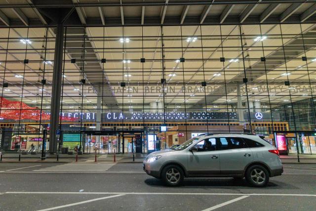 31 October 2025, Brandenburg, Schoenefeld: View of a terminal at BER airport. The capital's BER airport was closed for around two hours this evening due to the sighting of a drone. A spokesperson for the airport told dpa. According to the statement, flight operations were suspended between 8.08 pm and 9.58 pm. A number of flights were diverted. Photo: Carsten Koall/dpa