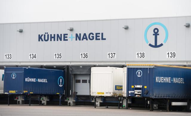 FILED - 28 January 2015, Hamburg: Trucks by the company Kuehne+Nagel stand at the industrial area Obergeorgswerder in Hamburg. Photo: Daniel Reinhardt/dpa