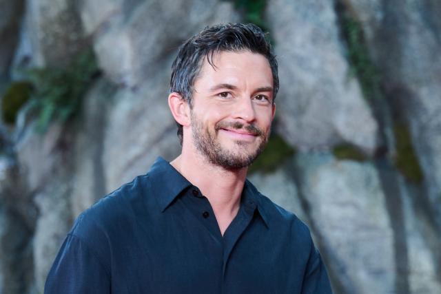 FILED - 18 June 2025, Berlin: English actor Jonathan Bailey arrives to the Zoo Palast for the German premiere of the movie "Jurassic World: Rebirth". Photo: Annette Riedl/dpa