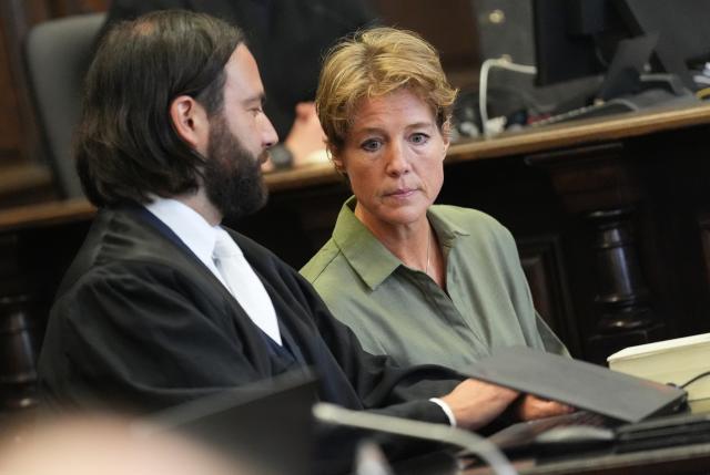 06 November 2025, Hamburg: German restaurateur and entrepreneur Christina Block stands next to her lawyer Ingo Bott at the start of her trial for alleged child abduction at Hamburg District Court. In a covert operation on New Year's Eve 2023/24, Block's two children were taken from Denmark to Germany. Photo: Marcus Brandt/dpa Pool/dpa