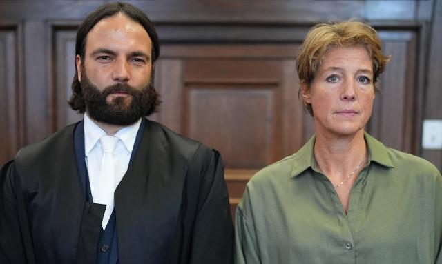 06 November 2025, Hamburg: German restaurateur and entrepreneur Christina Block stands next to her lawyer Ingo Bott at the start of her trial for alleged child abduction at Hamburg District Court. In a covert operation on New Year's Eve 2023/24, Block's two children were taken from Denmark to Germany. Photo: Marcus Brandt/dpa Pool/dpa
