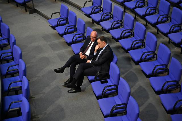 06 November 2025, Berlin: Peter Beyer (L) and Jens Spahn, CDU/CSU parliamentary group leader, attend the plenary session of the German Bundestag. Photo: Elisa Schu/dpa