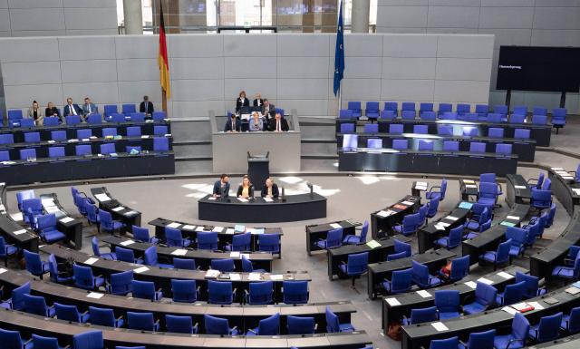 06 November 2025, Berlin: Julia Kloeckner (C), President of the German Bundestag, sits in front of an almost empty chamber during a so-called "sheep jump" session. Photo: Alicia Windzio/dpa
