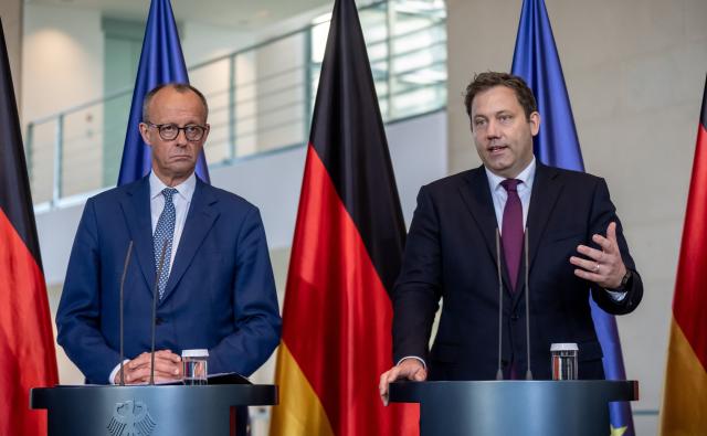 06 November 2025, Berlin: German Chancellor Friedrich Merz and German Minister of Finance, Lars Klingbeil speak during a press conference after the "Steel Summit" at the German Chancellery in Berlin. Photo: Michael Kappeler/dpa