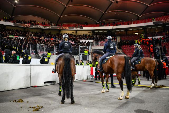 06 November 2025, Baden-Wuerttemberg, Stuttgart: Police horses stand in front of the Feyenoord Rotterdam fan block after the UEFA Europa League soccer match between VfB Stuttgart and Feyenoord Rotterdam at MHPArena. Photo: Tom Weller/dpa