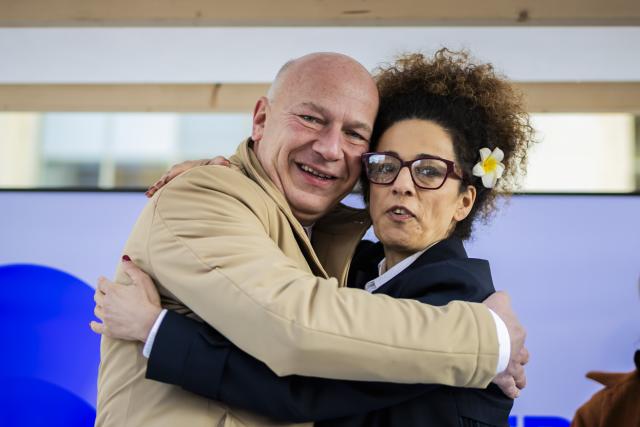 08 November 2025, Berlin: Kai Wegner, Governing Mayor of Berlin, and Masih Alinedschad, Iranian activist, embrace at the opening of Berlin Freedom Week in front of the House of Representatives. Photo: Christoph Soeder/dpa