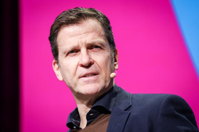 FILED - 06 February 2025, Hamburg: Oliver Bierhoff, former manager of the German national soccer team, speaks during a panel discussion the Sports Business industry conference (Spobis) at the CCH (Congress Center Hamburg). Bierhoff thinks the Bundesliga should consider playing games abroad to boost finances despite an expected fan backlash. Photo: Christian Charisius/dpa