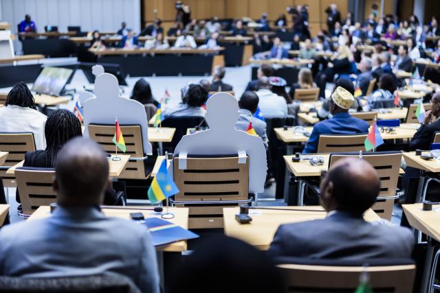 08 November 2025, Berlin: Participants sit beside cardboard displays representing absent delegates during the opening session of the World Liberty Congress at the Berlin House of Representatives, marking the start of Berlin Freedom Week. Photo: Christoph Soeder/dpa