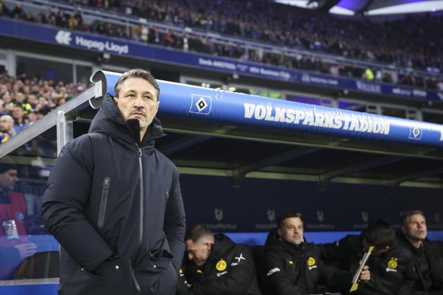 08 November 2025, Hamburg: Borussia Dortmund's coach Niko Kovac stands in the stadium ahead of the German Bundesliga soccer match between Hamburger SV and Borussia Dortmund at Volksparkstadion. Photo: Christian Charisius/dpa - IMPORTANT NOTICE: DFL and DFB regulations prohibit any use of photographs as image sequences and/or quasi-video.
