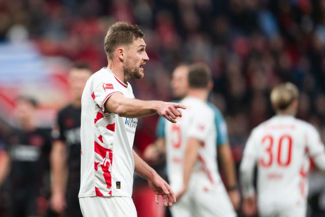08 November 2025, North Rhine-Westphalia, Leverkusen: Heidenheim's Patrick Mainka reacts during the German Bundesliga soccer match between Bayer 04 Leverkusen and 1. FC Heidenheim at BayArena. Photo: Marius Becker/dpa - IMPORTANT NOTICE: DFL and DFB regulations prohibit any use of photographs as image sequences and/or quasi-video.