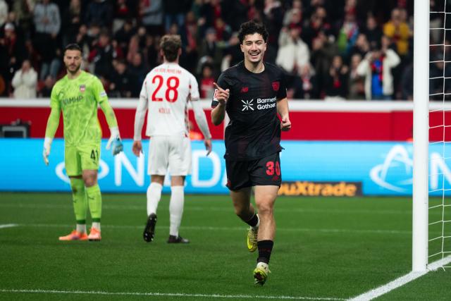 08 November 2025, North Rhine-Westphalia, Leverkusen: Bayer Leverkusen's Ibrahim Maza (R) celebrates after scoring his team's sixth goal during the German Bundesliga soccer match between Bayer 04 Leverkusen and 1. FC Heidenheim at BayArena. Photo: Marius Becker/dpa - IMPORTANT NOTICE: DFL and DFB regulations prohibit any use of photographs as image sequences and/or quasi-video.