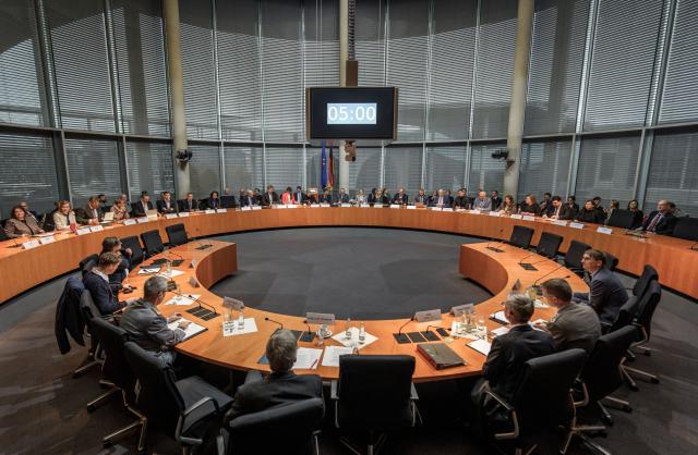 10 November 2025, Berlin: View into the meeting room of the Bundestag's Defense Committee. An expert hearing on the Military Service Act is to discuss compulsory military service. Photo: Michael Kappeler/dpa