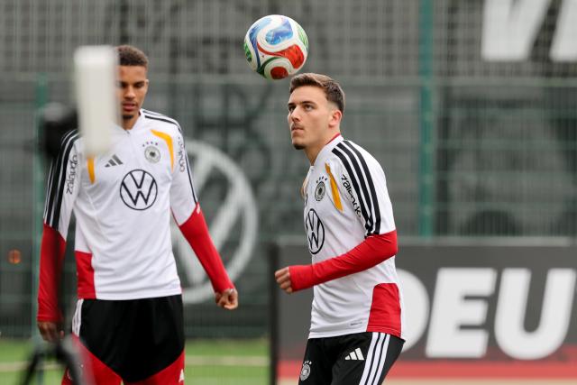 11 November 2025, Lower Saxony, Wolfsburg: Germany's Said El Mala heads the ball during the team's training session ahead of the FIFA World Cup European qualifying soccer matches against Luxembug and Slovakia. Photo: Christian Charisius/dpa