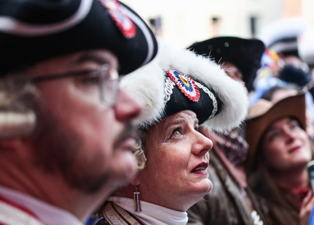 11 November 2025, Rhineland-Palatinate, Mainz: A guardswoman looks towards the stage during the start of the fifth season of the Carnival in Mainz. Photo: Hannes P Albert/dpa